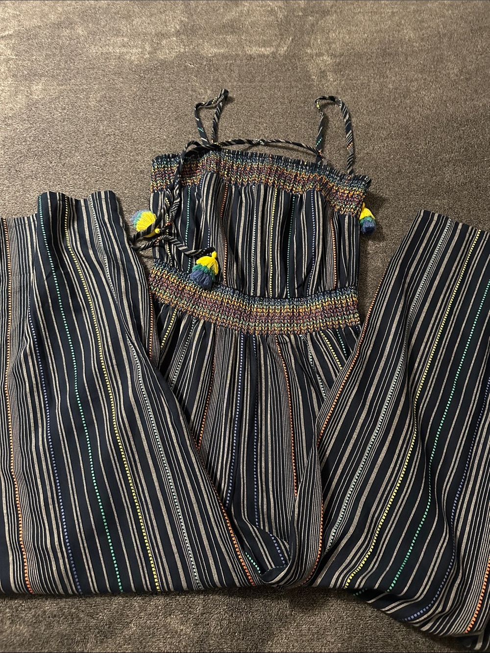 Anthropologie Navy Striped Smocked Jumpsuit with Multicolor Tassels